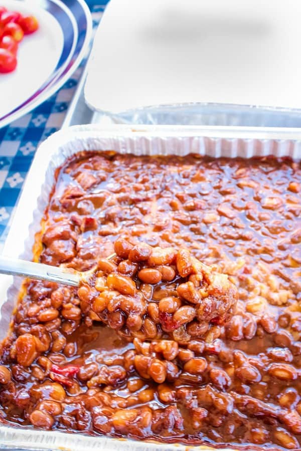 Grandma’s Real Southern Baked Beans is down home southern cooking at it’s best. Made with ingredients like bacon, roasted red pepper, molasses, brown sugar and cider vinegar, it's a family favorite! #mustlovehomecooking