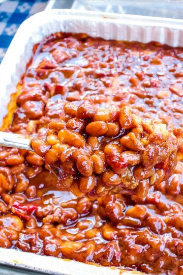 Grandma’s Real Southern Baked Beans is down home southern cooking at it’s best. Made with ingredients like bacon, roasted red pepper, molasses, brown sugar and cider vinegar, it's a family favorite! #mustlovehomecooking