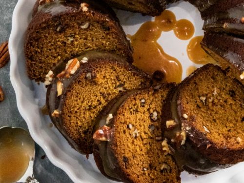 This Pumpkin Bundt Cake is irresistibly spiced, super moist and loaded with toasted pecans. An addictive fall treat you'll crave all year round! #mustlovehomecooking