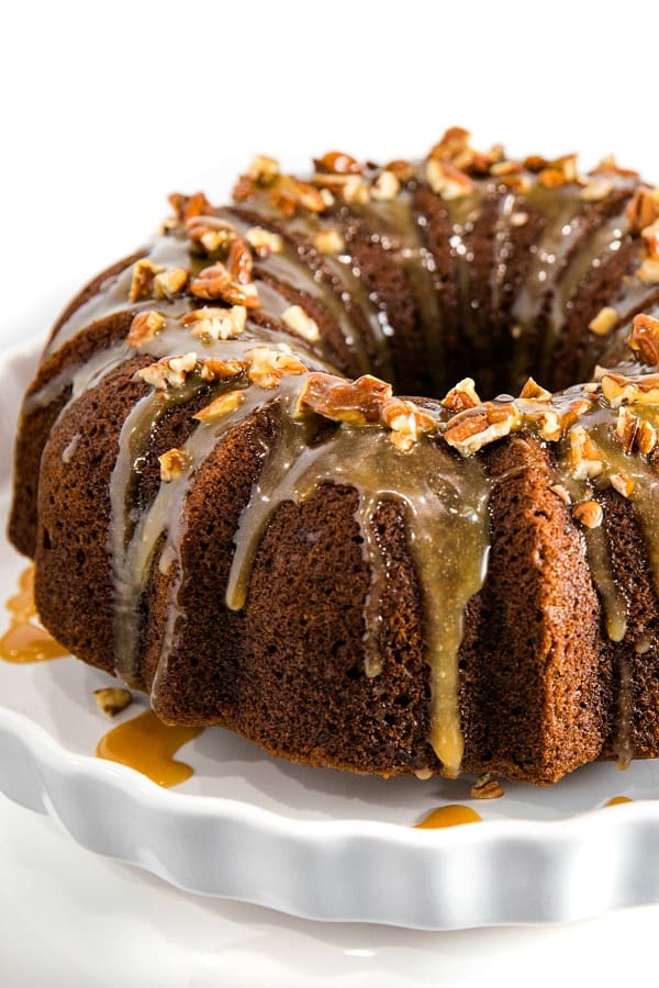 This Pumpkin Bundt Cake is irresistibly spiced, super moist and loaded with toasted pecans. An addictive fall treat you'll crave all year round!