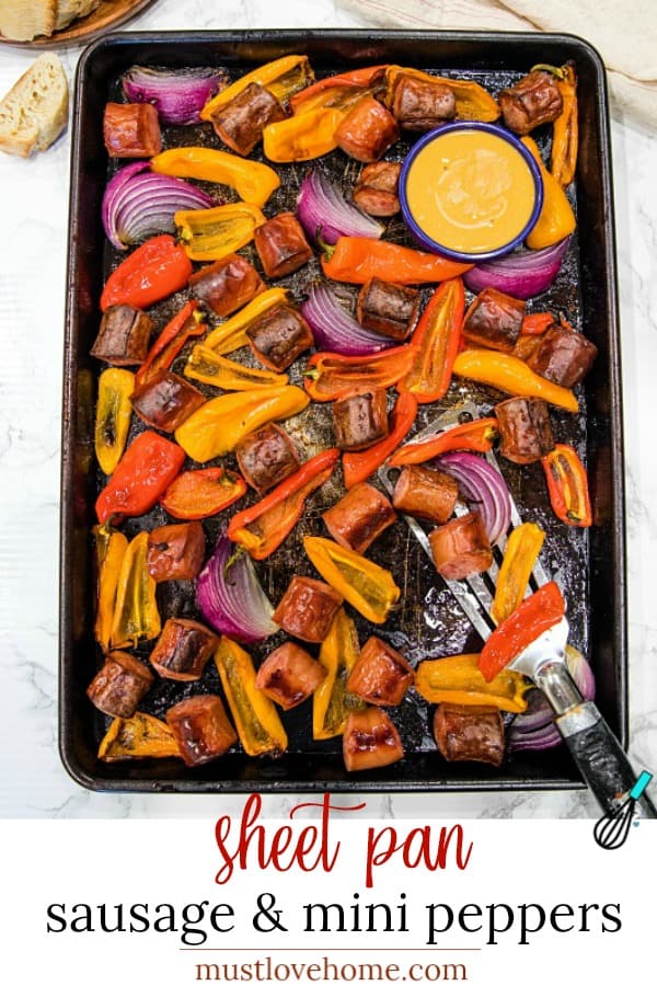 Delicious, versatile and fast, this Sheet Pan Smoked Sausage and Mini Peppers tossed with olive oil is an entire meal ready in 30 minutes!