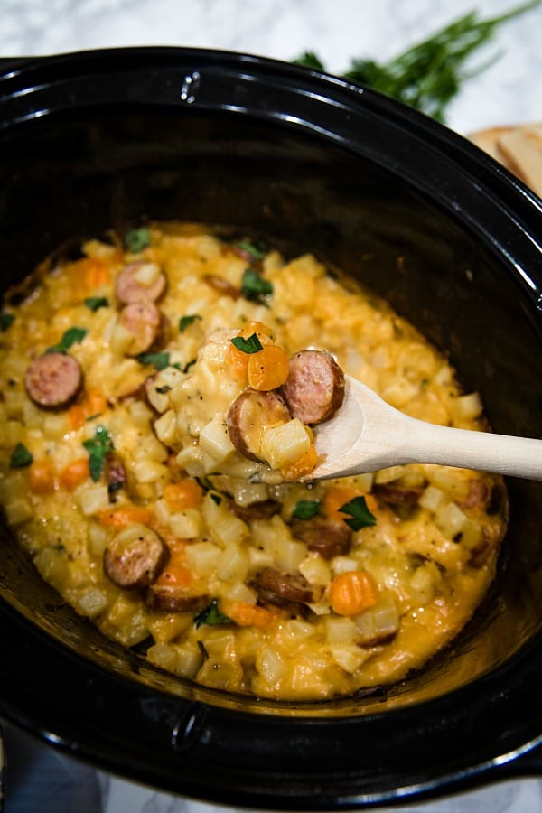 Slow Cooker Smoked Sausage Potatoes is a cozy crockpot meal that's always a dinnertime winner! Easy to make, it's simply comfort food in a bowl.