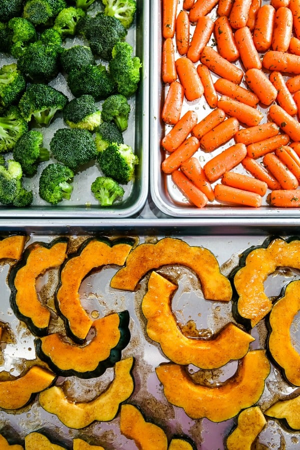 Three sheet pan thanksgiving sides made easy with minimal prep. Roasted Spiced Acorn Squash, Maple Mustard Broccoli and Herbed Carrots all in under one hour! #mustlovehomecooking