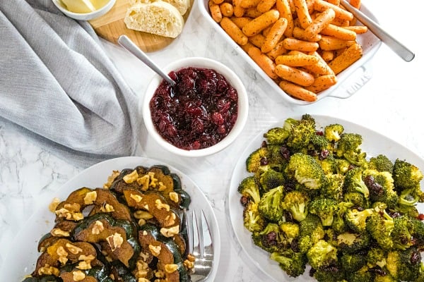 Three sheet pan thanksgiving sides made easy with minimal prep. Roasted Spiced Acorn Squash, Maple Mustard Broccoli and Herbed Carrots all in under one hour! #mustlovehomecooking