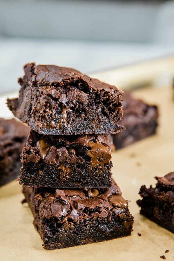 Fudge Brownies from scratch are made with cocoa and semi-sweet chocolate chips for a mouth-watering chewy brownie that will get chocolate lovers' hearts racing. #mustlovehomecooking