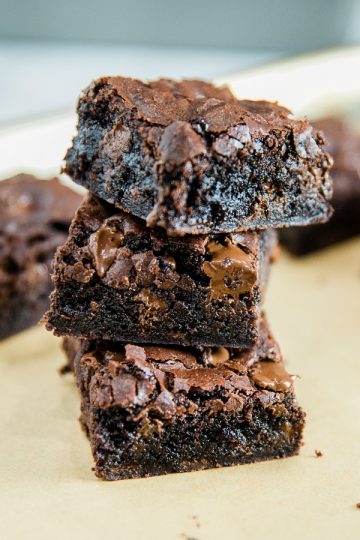 Fudge Brownies from scratch are made with cocoa and semi-sweet chocolate chips for a mouth-watering chewy brownie that will get chocolate lovers' hearts racing.