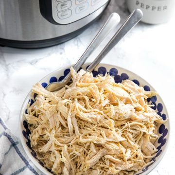 Easy Instant Pot Shredded Chicken is a deliciously easy recipe starter perfect for freezing. Perfect for quick sandwiches, quesadillas, rice dishes, and casseroles!