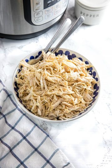 Easy Instant Pot Shredded Chicken is a deliciously easy recipe starter perfect for freezing. Perfect for quick sandwiches, quesadillas, rice dishes, and casseroles!