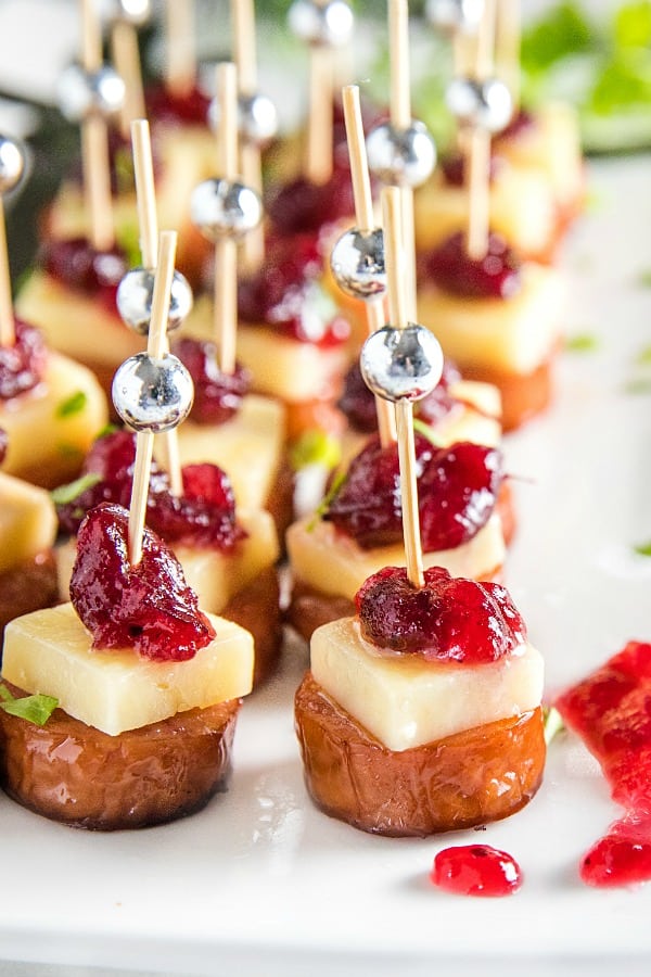 Sheet Pan Smoked Sausage with Cranberry Bites made with cubes of white cheddar and whole cranberry sauce. They're incredibly easy and perfect for holidays or an appetizer for any gathering! #mustlovehomecooki8ng