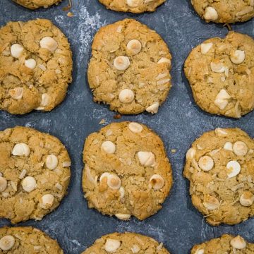 Chewy Chocolate Chip Coconut Cookies are crisp and buttery on the outside with an irresistibly soft and chewy inside. A holiday favorite and great for gift giving too!