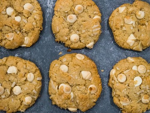 Chewy Chocolate Chip Coconut Cookies are crisp and buttery on the outside with an irresistibly soft and chewy inside. A holiday favorite and great for gift giving too!