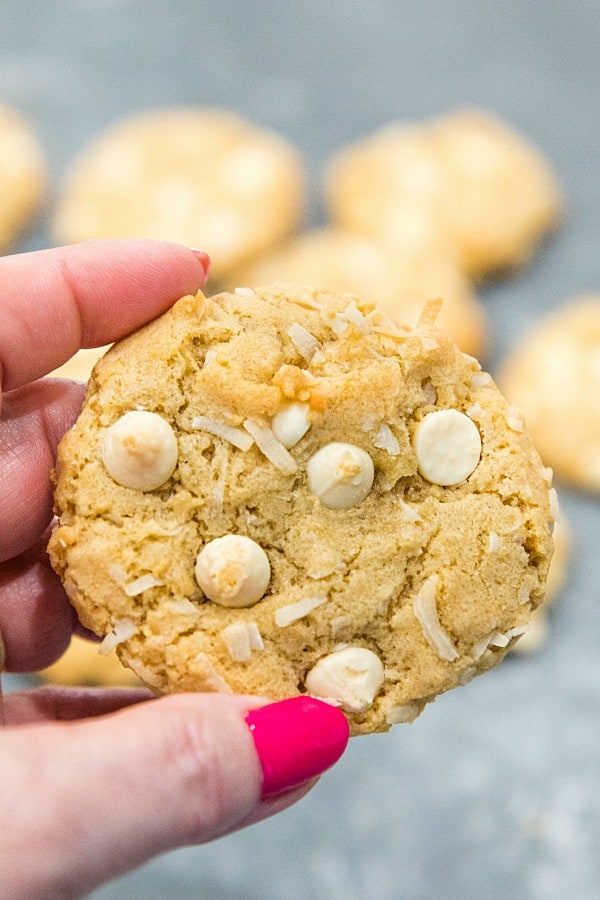 Chewy Chocolate Chip Coconut Cookies are crisp and buttery on the outside with an irresistibly soft and chewy inside. A holiday favorite and great for gift giving too! #mustlovehomecooking