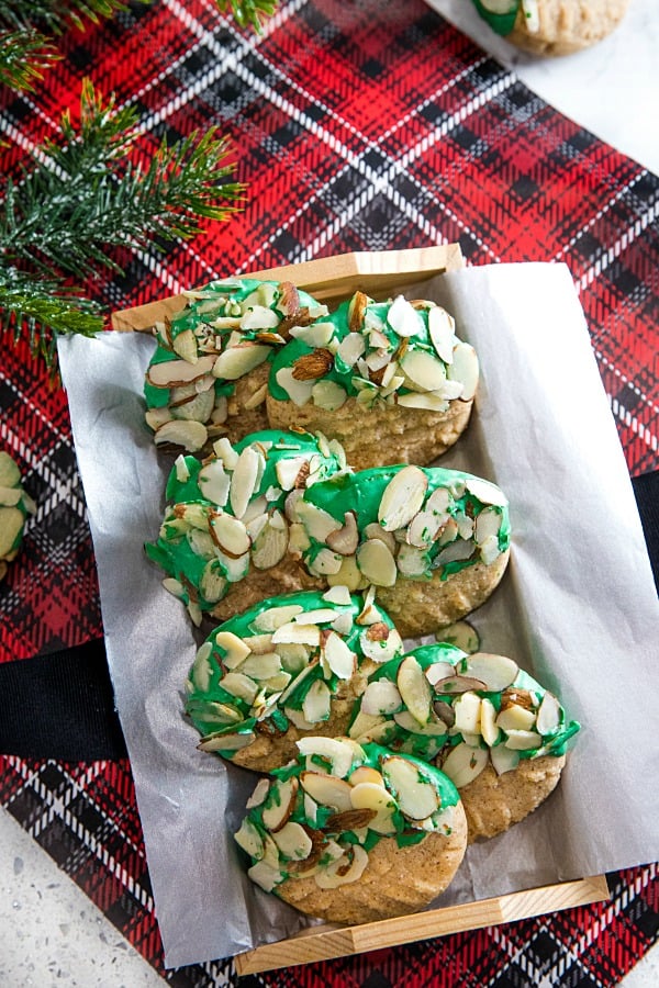 Easy to make Double Almond Butter Cookies - shortbread cookie taste dressed for the holidays with colored chocolate and a sprinkle of almonds! #mustlovehomecooking
