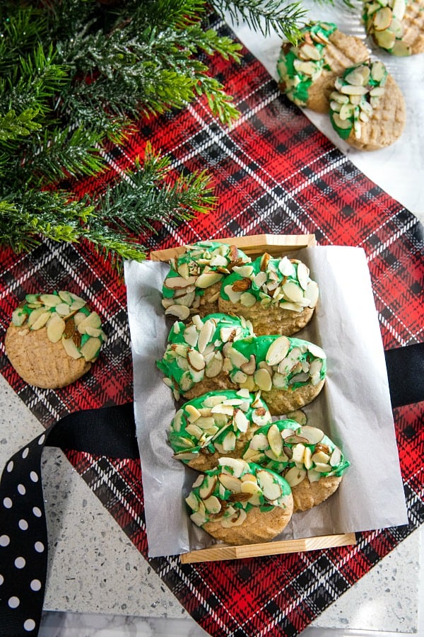 Easy to make Double Almond Butter Cookies - shortbread cookie taste dressed for the holidays with colored chocolate and a sprinkle of almonds! #mustlovehomecooking