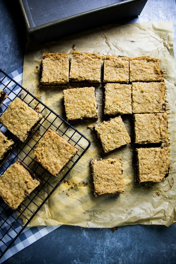 Buttery and decadent, these easy Orange Walnut Date Squares with oats, brown sugar and a splash of cheer are just in time for holiday baking.