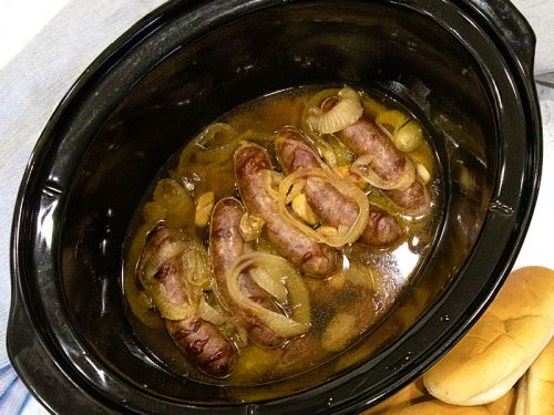 Full of malt and garlic flavors, these slow cooker beer brats are one of the easiest and tastiest crock pot recipes you'll ever make.