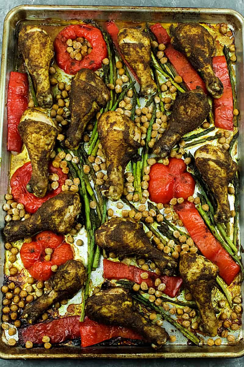Super easy Sheet Pan Moroccan Chicken are tasty spiced chicken legs perfectly crispy on the outside and deliciously succulent on the inside. #mustlovehomecooking
