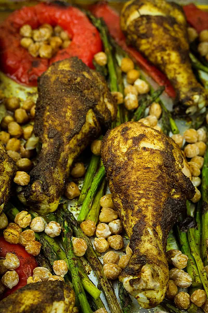 Super easy Sheet Pan Moroccan Chicken are tasty spiced chicken legs perfectly crispy on the outside and deliciously succulent on the inside. #mustlovehomecooking