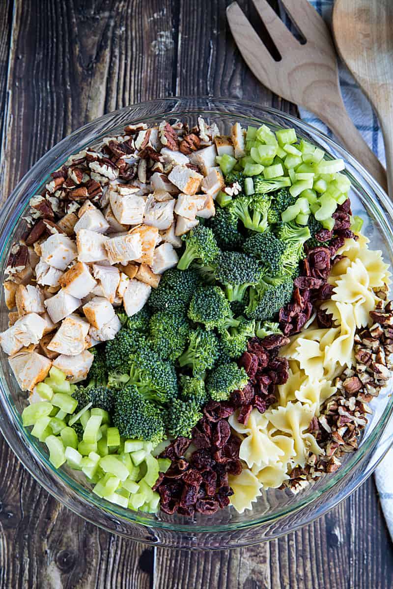 This chunky Broccoli Chicken Pasta Salad combines broccoli salad and chicken salad into one delicious dish that can be eaten on it's own or perfect as a side. #mustlovehomecooking