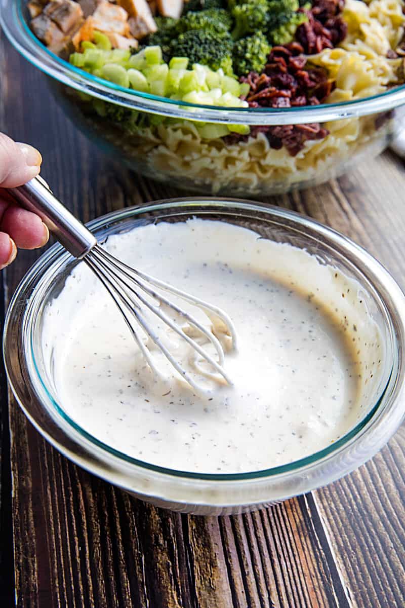 This chunky Broccoli Chicken Pasta Salad combines broccoli salad and chicken salad into one delicious dish that can be eaten on it's own or perfect as a side. #mustlovehomecooking