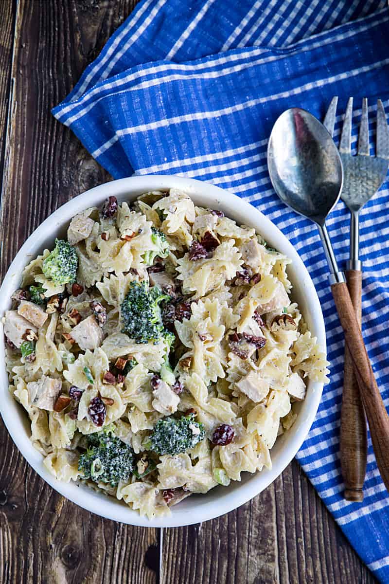 This chunky Broccoli Chicken Pasta Salad combines broccoli salad and chicken salad into one delicious dish that can be eaten on it's own or perfect as a side. #mustlovehomecooking