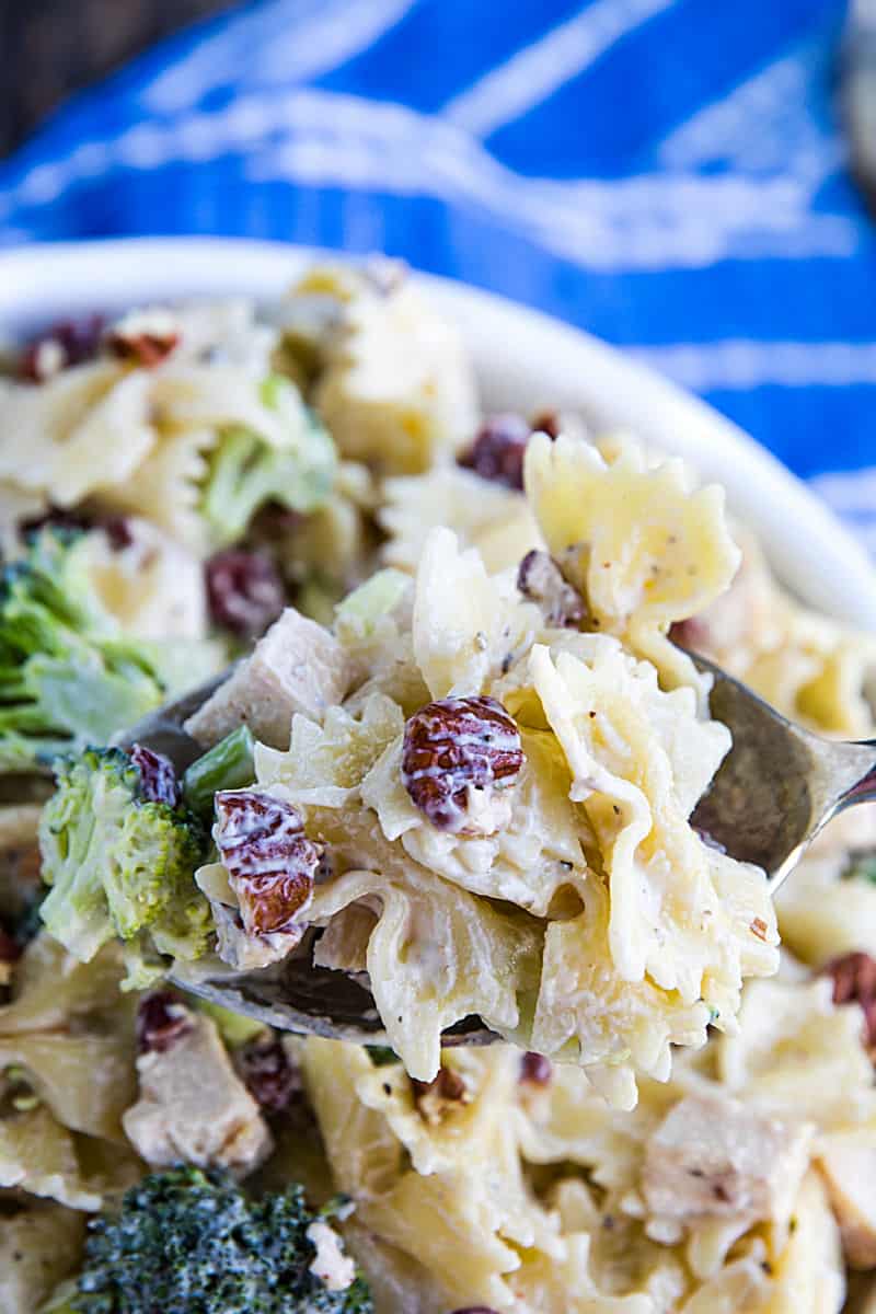 This chunky Broccoli Chicken Pasta Salad combines broccoli salad and chicken salad into one delicious dish that can be eaten on it's own or perfect as a side. #mustlovehomecooking