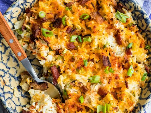 Easy Oven Hash Browns, crispy golden and loaded with bacon and cheese, are the stuff of breakfast dreams. #mustlovehomecooking