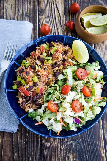 Instant Pot Black Beans and Rice is made quick and easy using a pressure cooker. Mildly spicy with green chilies and garlic, it's made from pantry staples and ready to serve in minutes. #mustlovehomecooking