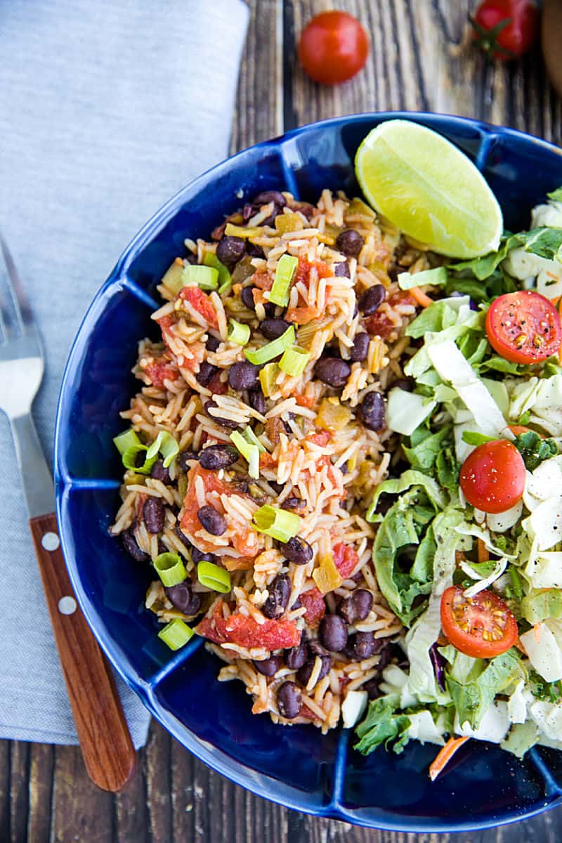 Instant Pot Black Beans and Rice is made quick and easy using a pressure cooker. Mildly spicy with green chilies and garlic, it's made from pantry staples and ready to serve in minutes. #mustlovehomecooking