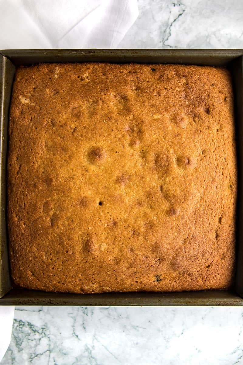 baked blueberry upside down cake in square metal pan