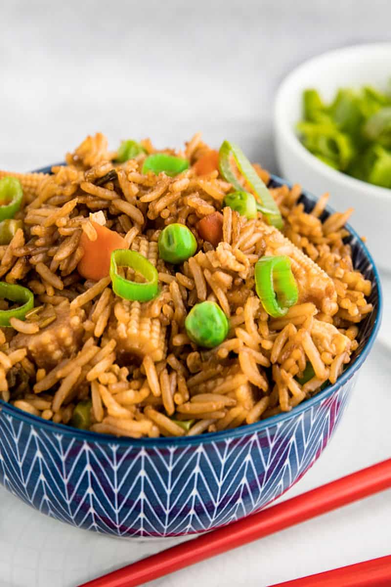 Best Ever Deluxe Fried Rice is a take-away style rice recipe packed with delicious flavor and healthy vegetables that's ready in just minutes! #mustlovehomecooking