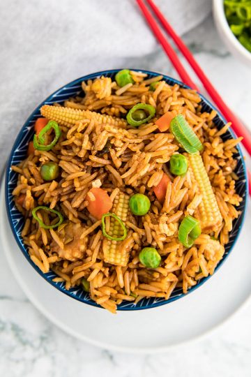 Best Ever Deluxe Fried Rice is a take-away style rice recipe packed with delicious flavor and healthy vegetables that's ready in just minutes! #mustlovehomecooking