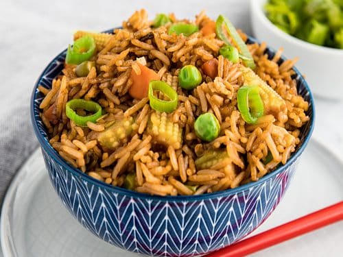Best Ever Deluxe Fried Rice is a take-away style rice recipe packed with delicious flavor and healthy vegetables that's ready in just minutes! #mustlovehomecooking