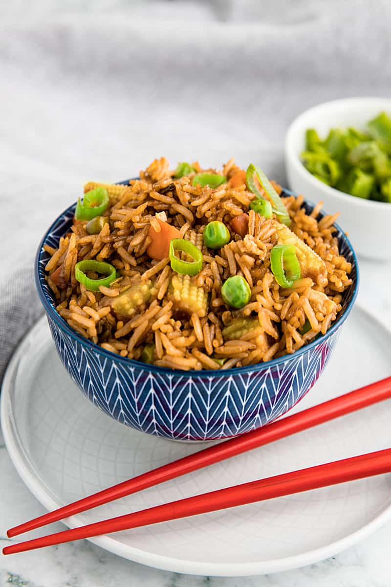 Best Ever Deluxe Fried Rice is a take-away style rice recipe packed with delicious flavor and healthy vegetables that's ready in just minutes! #mustlovehomecooking