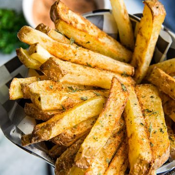 Homemade French Fry Seasoning is quick and simple to make and adds amazing flavor to plain old fries! Sprinkle on fries made in the air fryer, deep fryer and the oven! #mustlovehomecooking