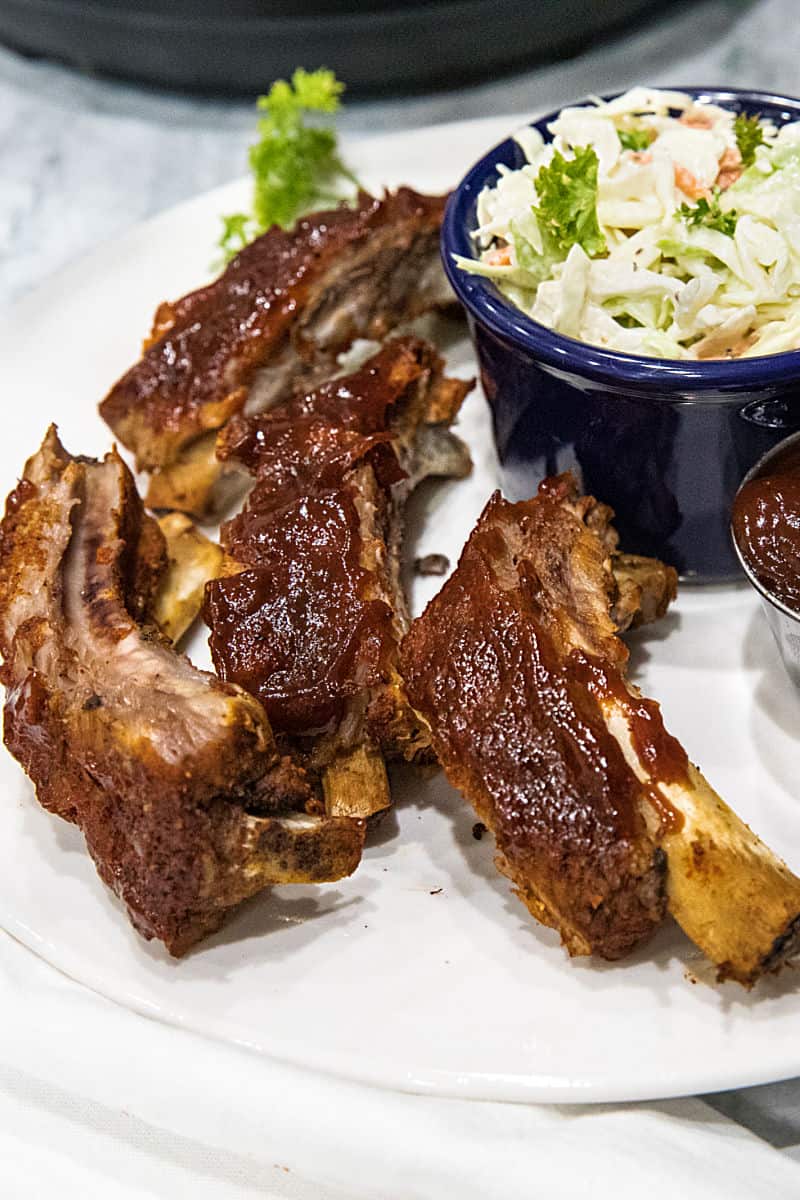 Best Instant Pot Ribs are moist, fall off the bone ribs made easy in the pressure cooker. In just three easy steps and under 40 minutes, they're keto, paleo and definitely family-friendly.  
