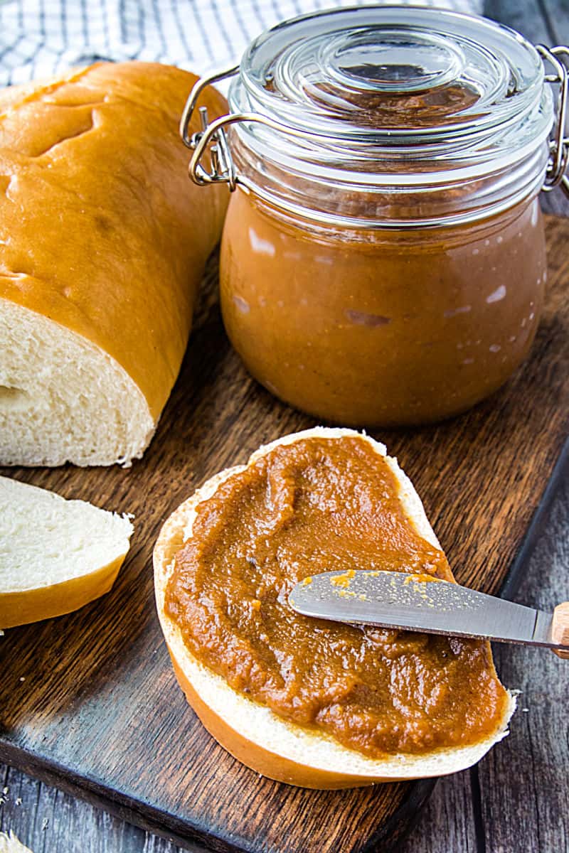 Homemade Pecan Pumpkin butter with pumpkin puree, brown sugar and pecan flavoring is smooth and delicious slathered atop toasted bread, rolls and bagels. #mustlovehomecooking