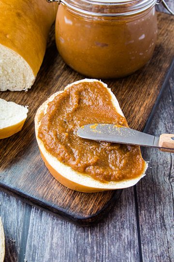 Homemade Pecan Pumpkin butter with pumpkin puree, brown sugar and pecan flavoring is smooth and delicious slathered atop toasted bread, rolls and bagels. #mustlovehomecooking