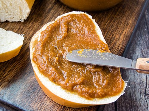 Homemade Pecan Pumpkin butter with pumpkin puree, brown sugar and pecan flavoring is smooth and delicious slathered atop toasted bread, rolls and bagels. #mustlovehomecooking