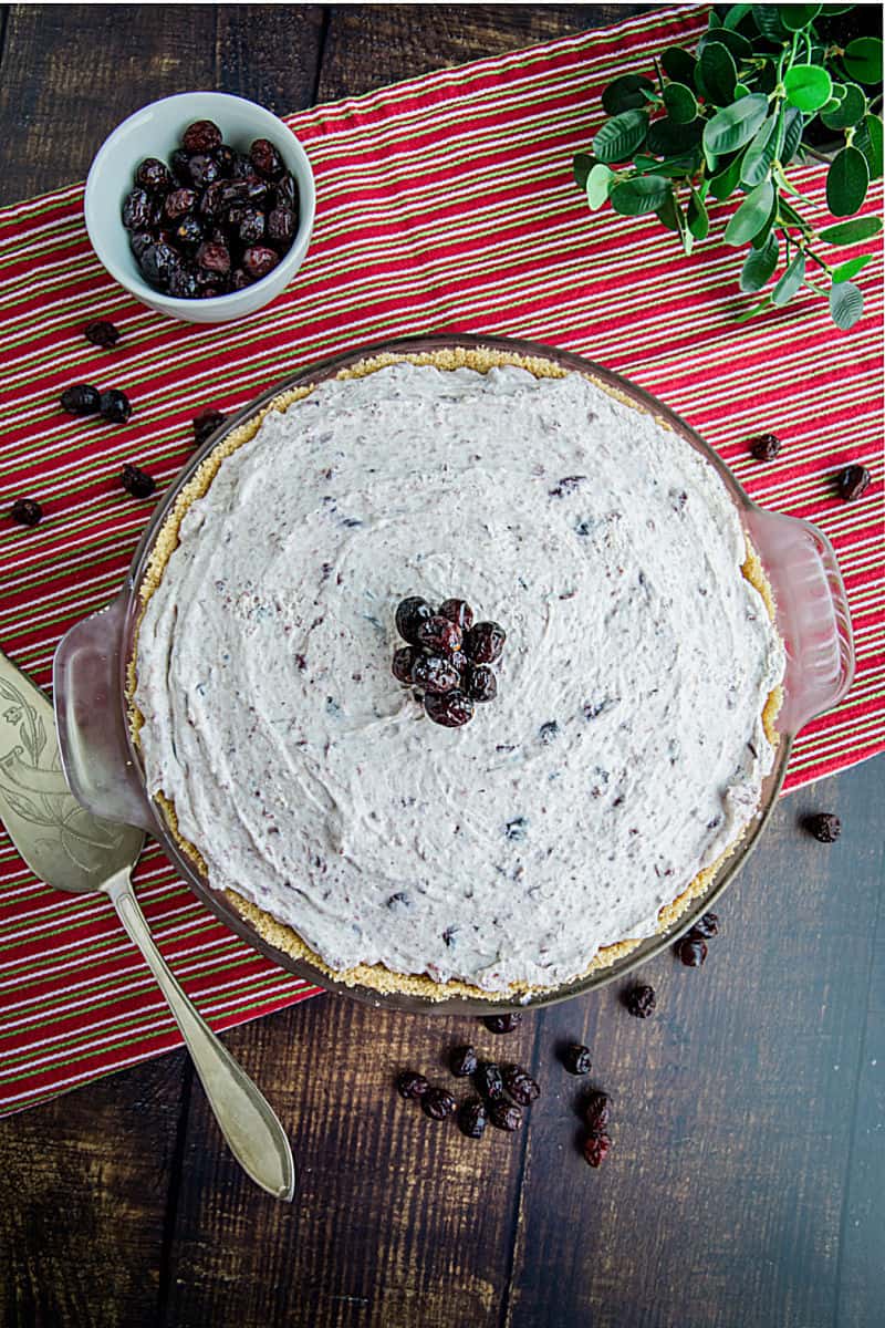 An easy Whipped Cranberry Pie recipe that's perfect for your Thanksgiving table. It's made luscious with cranberry sauce and whipped topping! #mustlovehomecooking