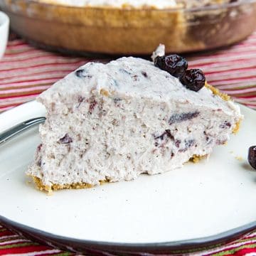 An easy Whipped Cranberry Pie recipe that's perfect for your Thanksgiving table. It's made luscious with cranberry sauce and whipped topping! #mustlovehomecooking