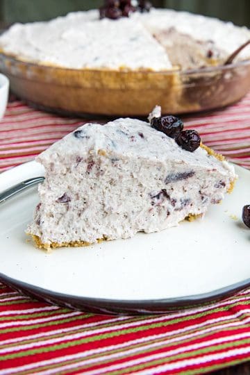 An easy Whipped Cranberry Pie recipe that's perfect for your Thanksgiving table. It's made luscious with cranberry sauce and whipped topping! #mustlovehomecooking