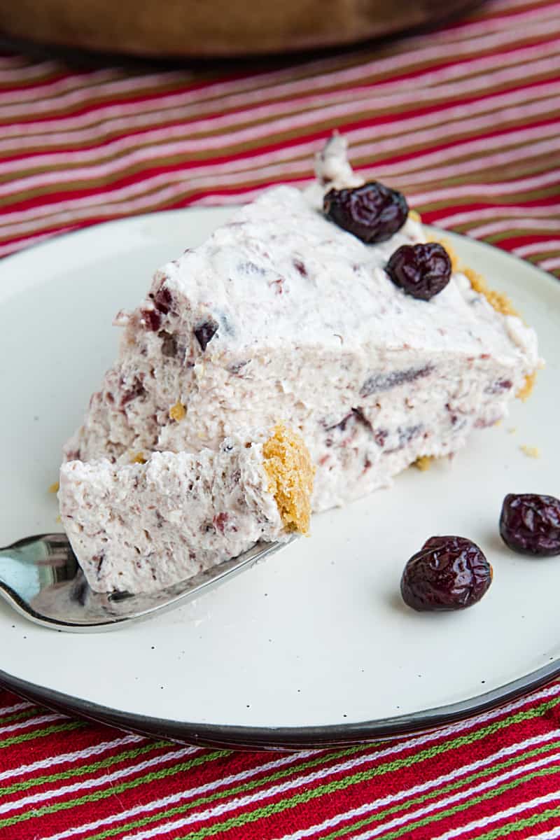 An easy Whipped Cranberry Pie recipe that's perfect for your Thanksgiving table. It's made luscious with cranberry sauce and whipped topping! #mustlovehomecooking