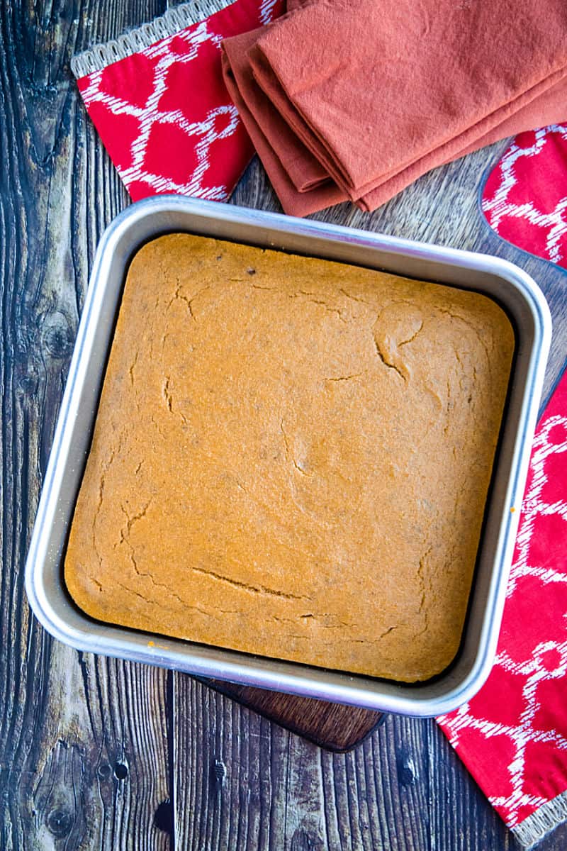 Easy Pumpkin Cornbread is sweet and moist and with a touch of fall pumpkin flavor! Baked into mini muffins or in a pan, this is a maple cinnamon treat that is sure to please.#mustlovehomecooking