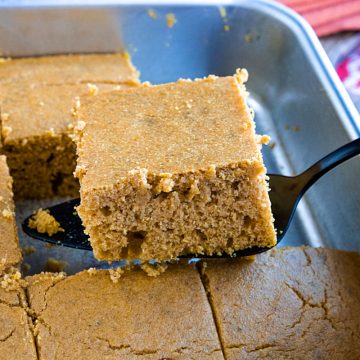 Easy Pumpkin Cornbread is sweet and moist and with a touch of fall pumpkin flavor! Baked into mini muffins or in a pan, this is a maple cinnamon treat that is sure to please.#mustlovehomecooking