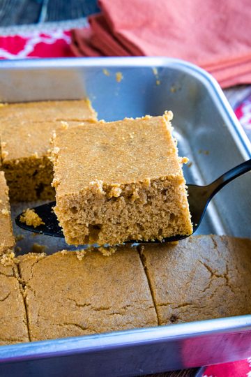 Easy Pumpkin Cornbread is sweet and moist and with a touch of fall pumpkin flavor! Baked into mini muffins or in a pan, this is a maple cinnamon treat that is sure to please.#mustlovehomecooking