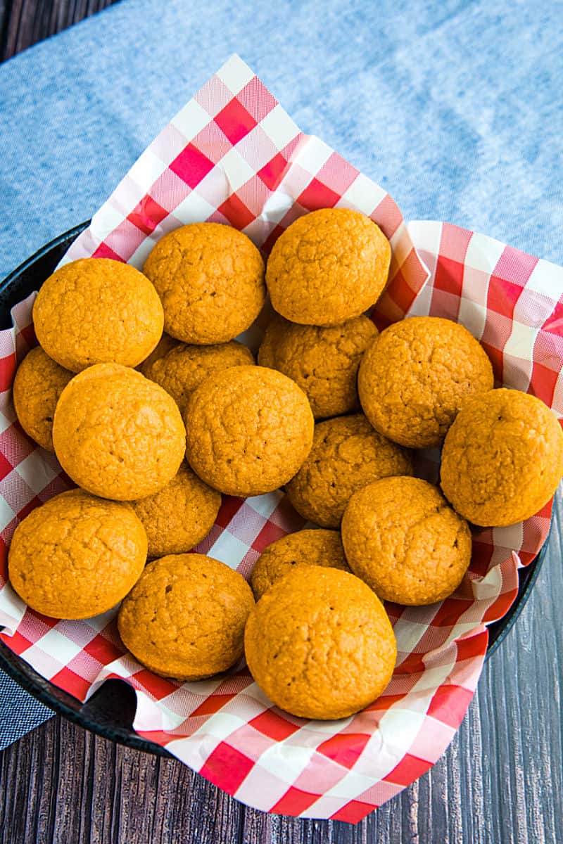Easy Pumpkin Cornbread is sweet and moist and with a touch of fall pumpkin flavor! Baked into mini muffins or in a pan, this is a maple cinnamon treat that is sure to please.#mustlovehomecooking