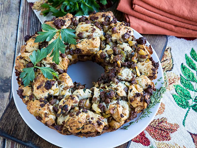 Pull-apart refrigerator biscuits meets sausage stuffing flavors in this irresistible twist from your classic Thanksgiving dish. #mustlovehomecooking