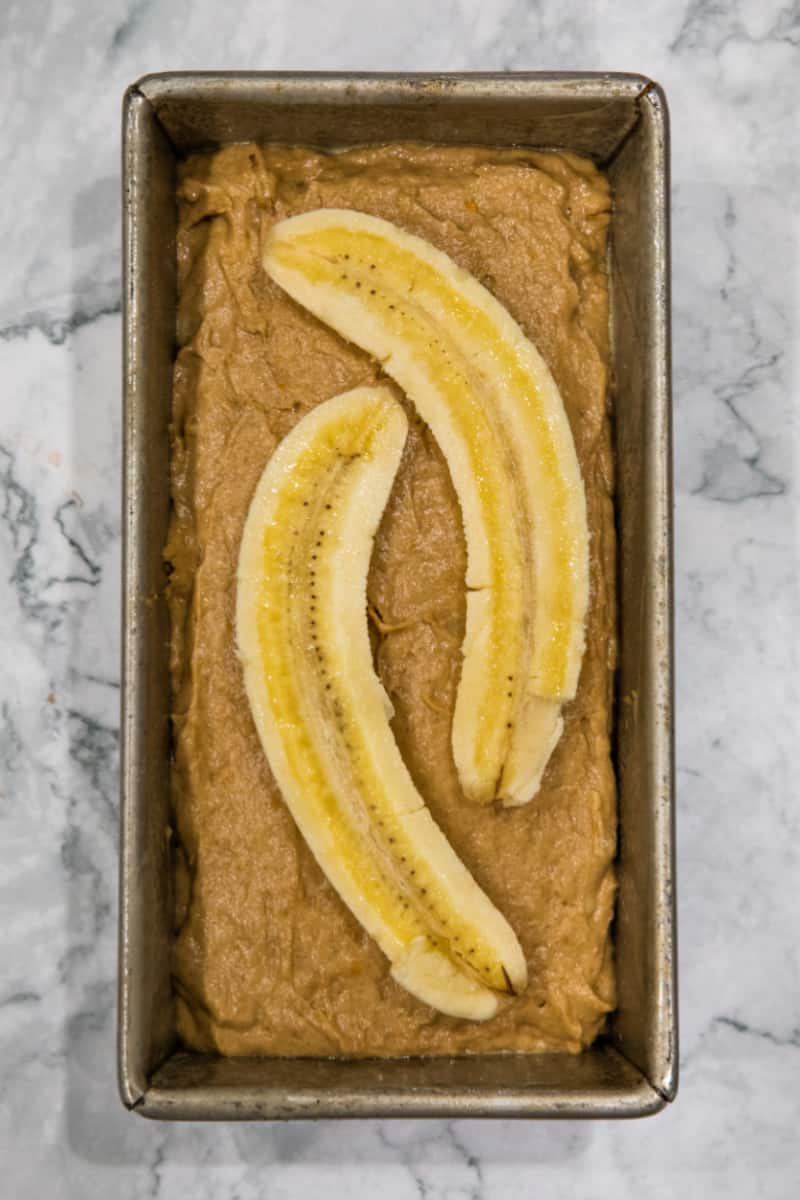 Easy "tried-and-true' homemade Banana Bread recipe that is the best way to use up over-ripe bananas. Made with brown sugar for a moist, dark loaf perfect to go with morning coffee or serve as dessert!