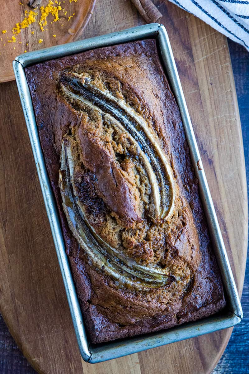 Easy "tried-and-true' homemade Banana Bread recipe that is the best way to use up over-ripe bananas. Made with brown sugar for a moist, dark loaf perfect to go with morning coffee or serve as dessert! #mustlovehomecooking